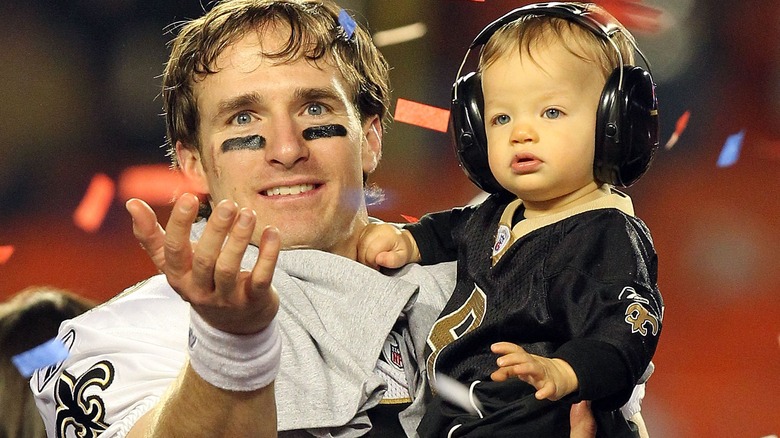 Drew Brees, posant avec son fils Baylen Brees