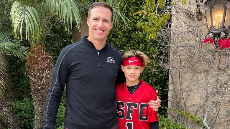 Drew Brees, posant avec son fils Baylen