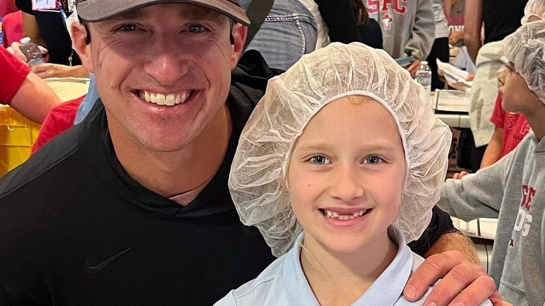 Drew Brees et sa fille Rylen, tous deux souriants